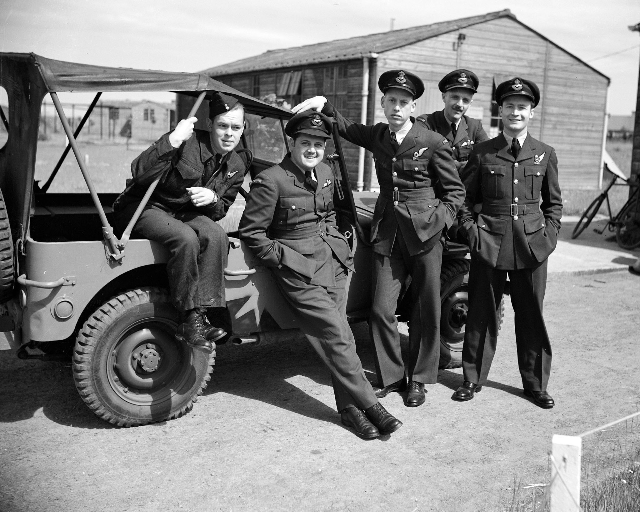 Some of the crew of a Canadian Canso flying boat “C for Charlie”, photographed in Iceland before setting out on anti-submarine patrol in the North Atlantic on January 22, 1944. From left to right: Sergeant Donald Scott, Packenham, Ontario; Flying Officer Bernard Denomy, Chatham, Ontario; Flying Officer Sydney Matheson, Nelson, British Columbia; Flight Lieutenant David Hornell, Mimico, Ontario; and Flying Officer Graham Campbell, Vancouver, British Columbia. PHOTO: DND Archives, PL-30826