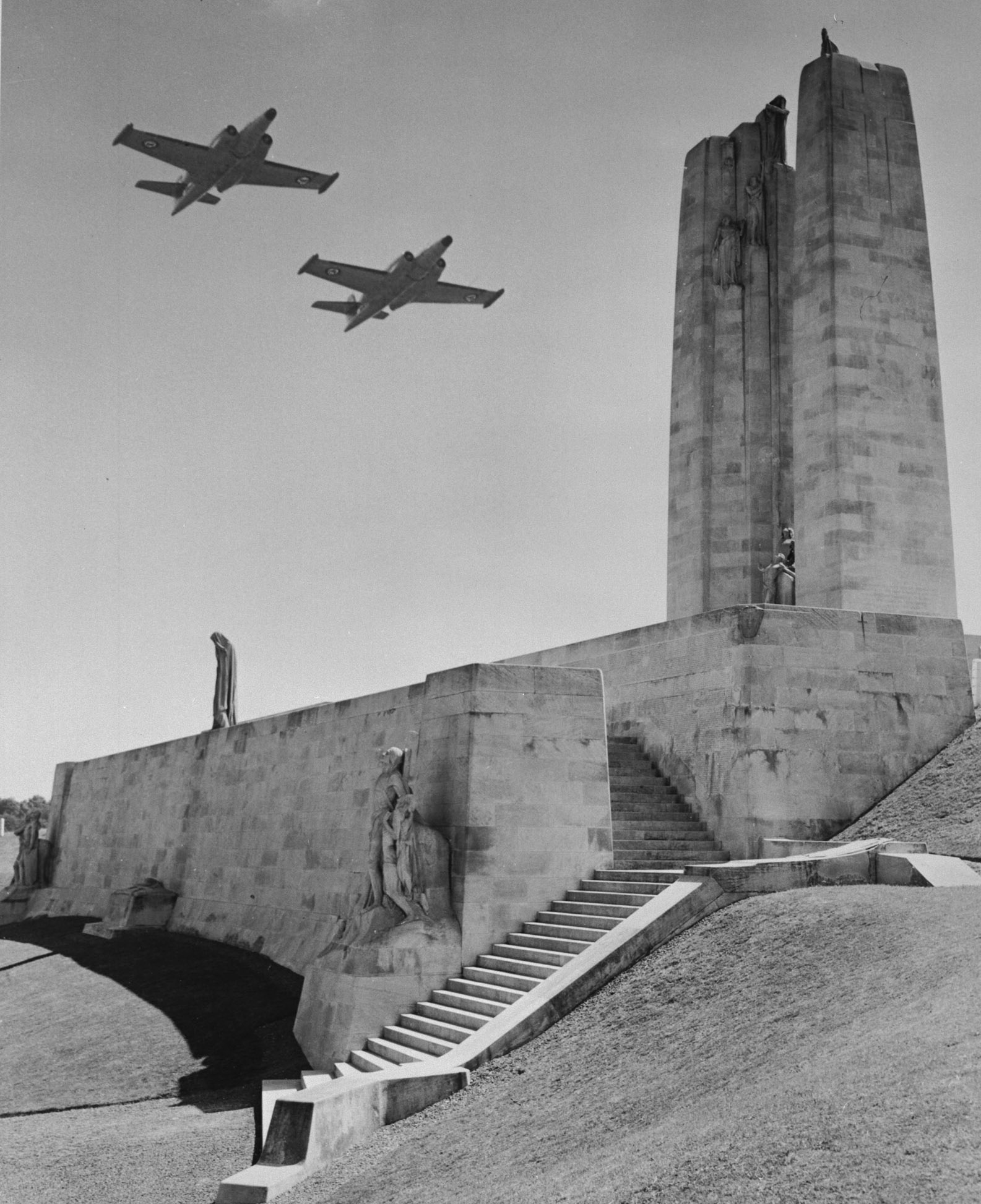 The Royal Flying Corps, which included many Canadian flyers, carries out aerial reconnaissance and photography of enemy positions leading up to the Battle of Vimy Ridge and provided artillery spotting before and during the battle. Several Canadian airmen were killed in the days before and after the battle. In this undated file photo, CF-100 Canucks fly over the Canadian War Memorial at Vimy Ridge in France. PHOTO: PL-122793, DND Archives